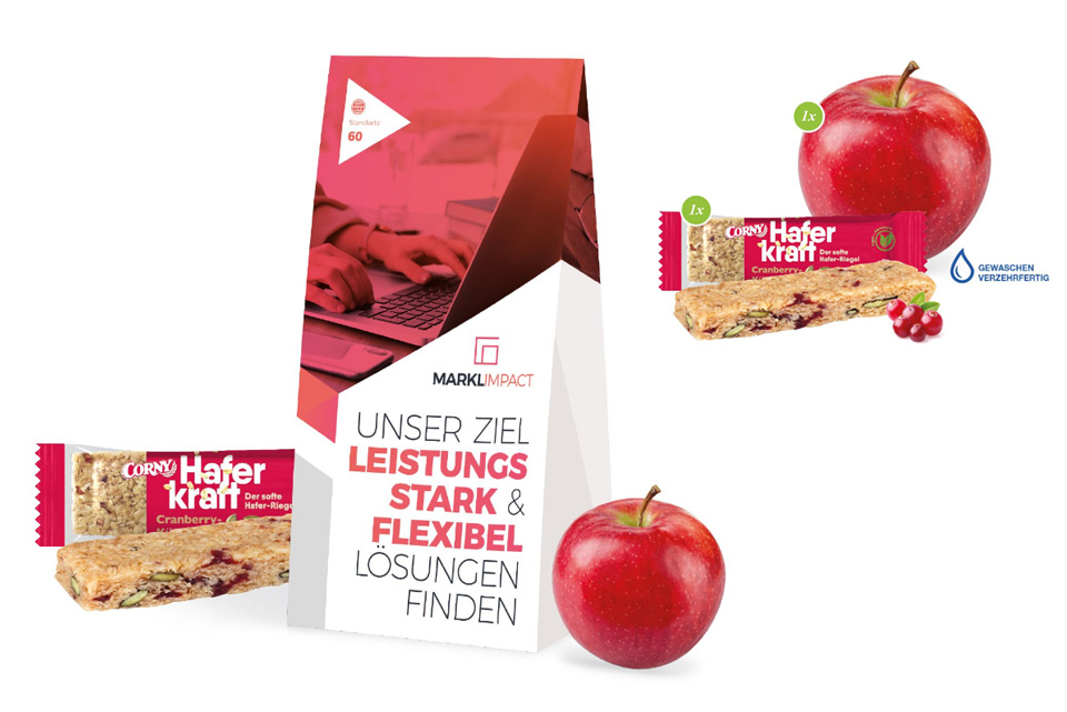 Power Bag individuell bedruckt und bef&uuml;llt mit einem Apfel und einem M&uuml;sliriegel als Werbeartikel