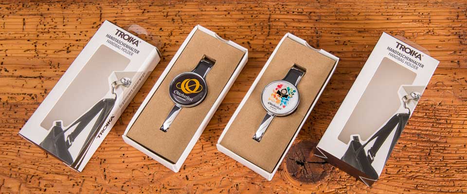 Neue Troika Oktoberfest Taschenhalter mit original Oktoberfest Motiv als Werbeartikel. 