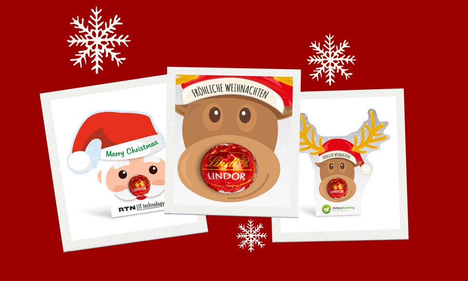 Drei Polaroids mit Bildern der Lindt Lindor Werbekartonage Rentier und Santa Claus als Werbertikel.