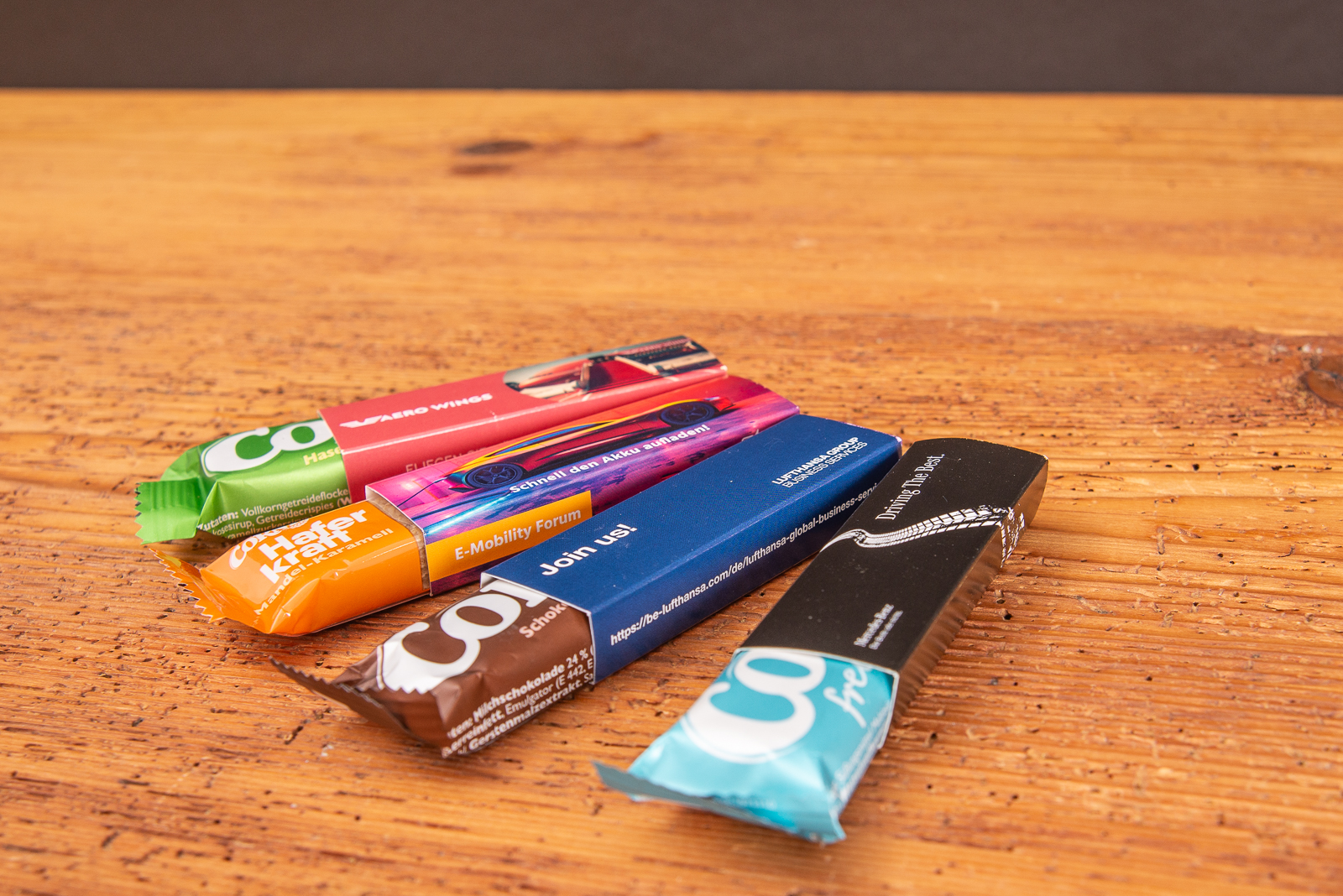 Corny M&uuml;sliriegel in verschiedenen Sorten als Werbeartikel im Werbeschuber bestellen