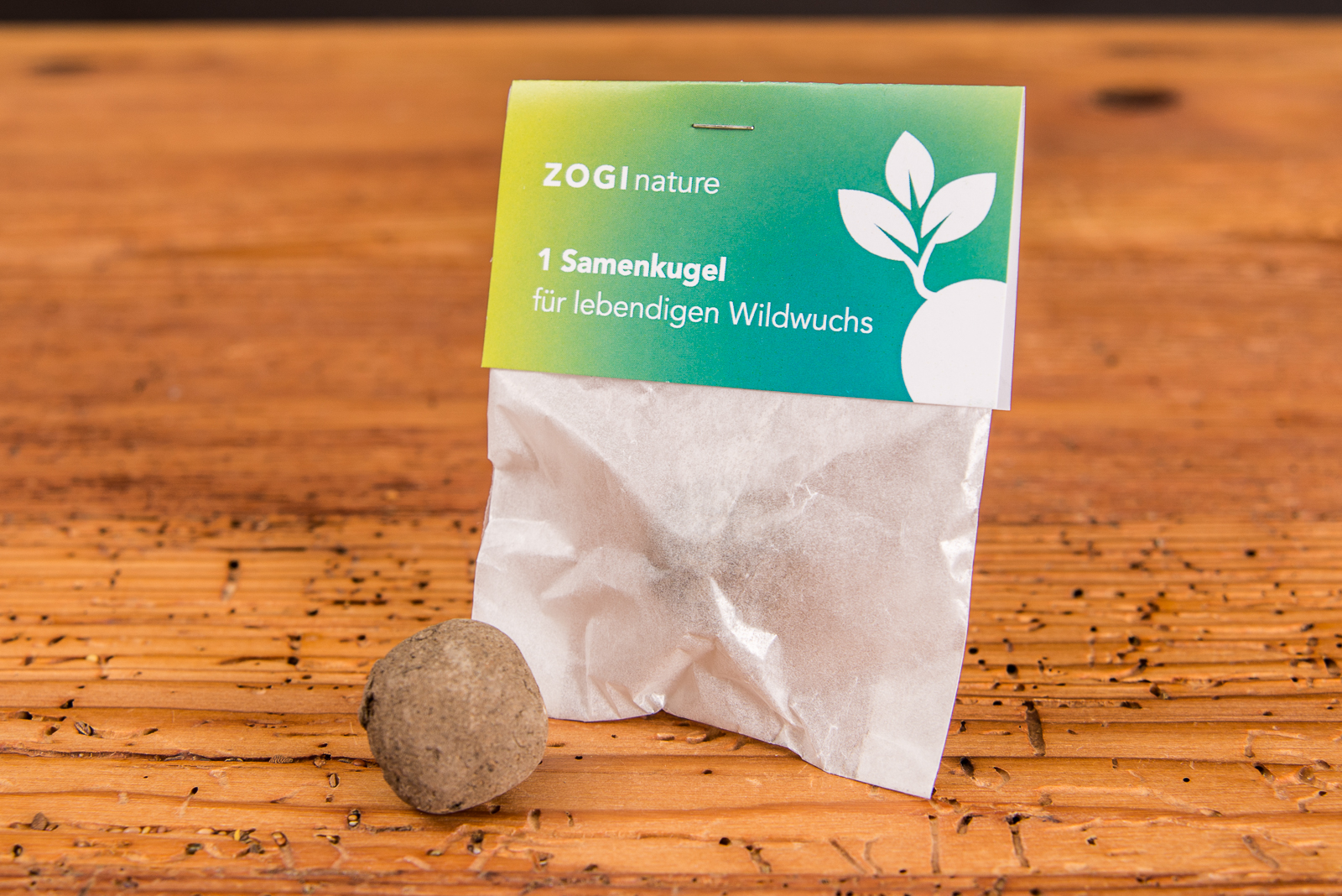 Samenbombe im Pergaminbeutelchen mit Werbedruck als niedliches Werbegeschenk f&uuml;r Messen und Veranstaltungen 