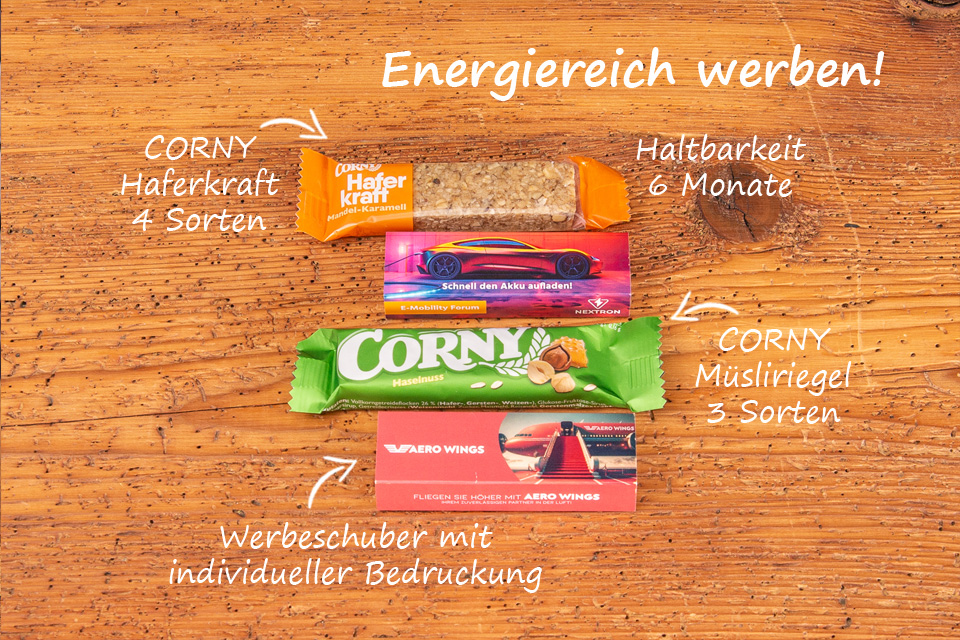 Messeartikel mit Biss - Corny M&uuml;sliriegel und Corny Haferkraftriegel individuell im bedruckten Werbeschuber gestalten