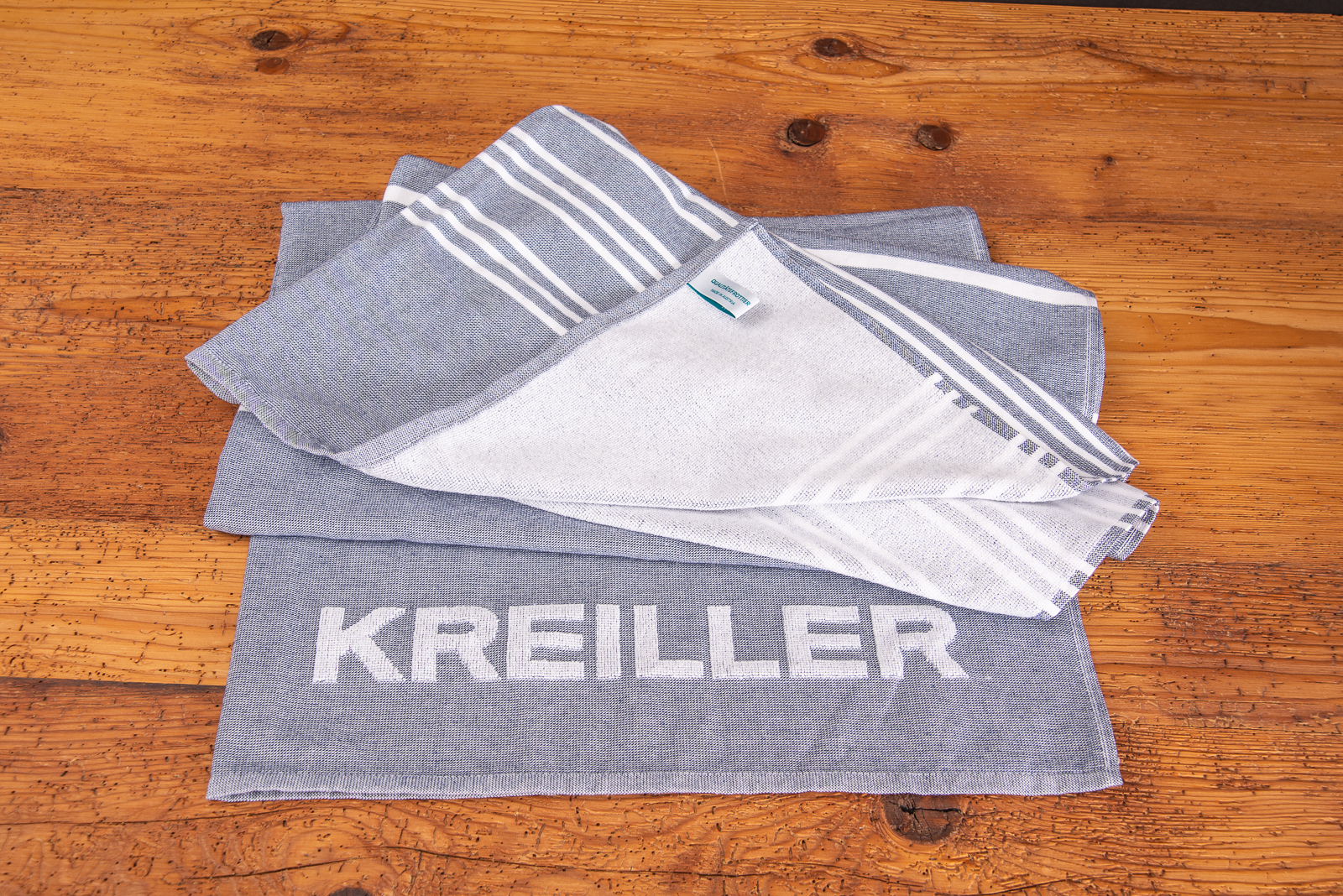 Strandtuch mit Logo-Einwebung als Werbemittel bei Messen und Events.