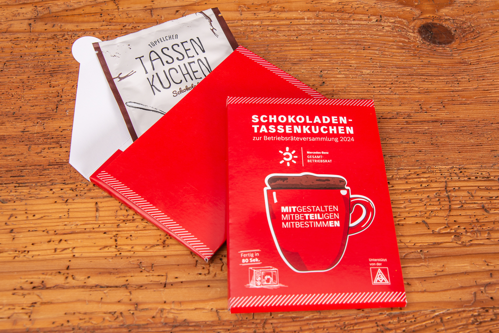 T&uuml;pfelchen Tassenkuchen mit individueller Verpackung als Mailingartikel.