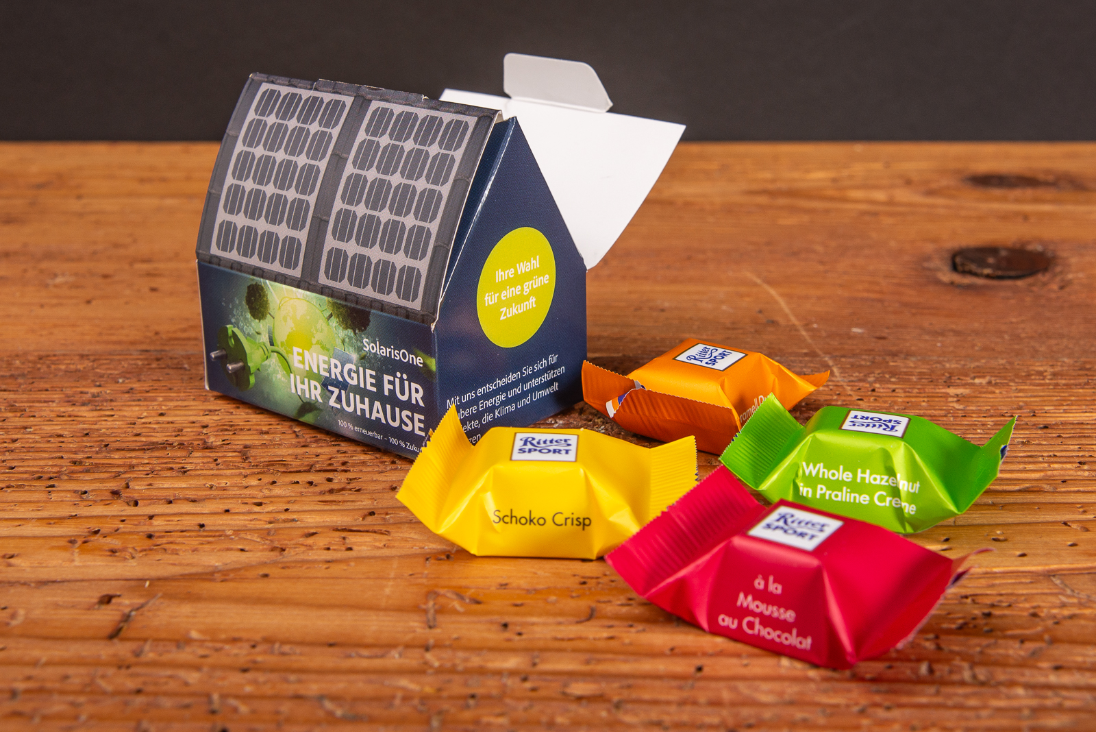 3D Geschenk Haus vollfl&auml;chig bedruckt mit F&uuml;llung als Give-away f&uuml;r Kunden auf Messen und Veranstaltungen.