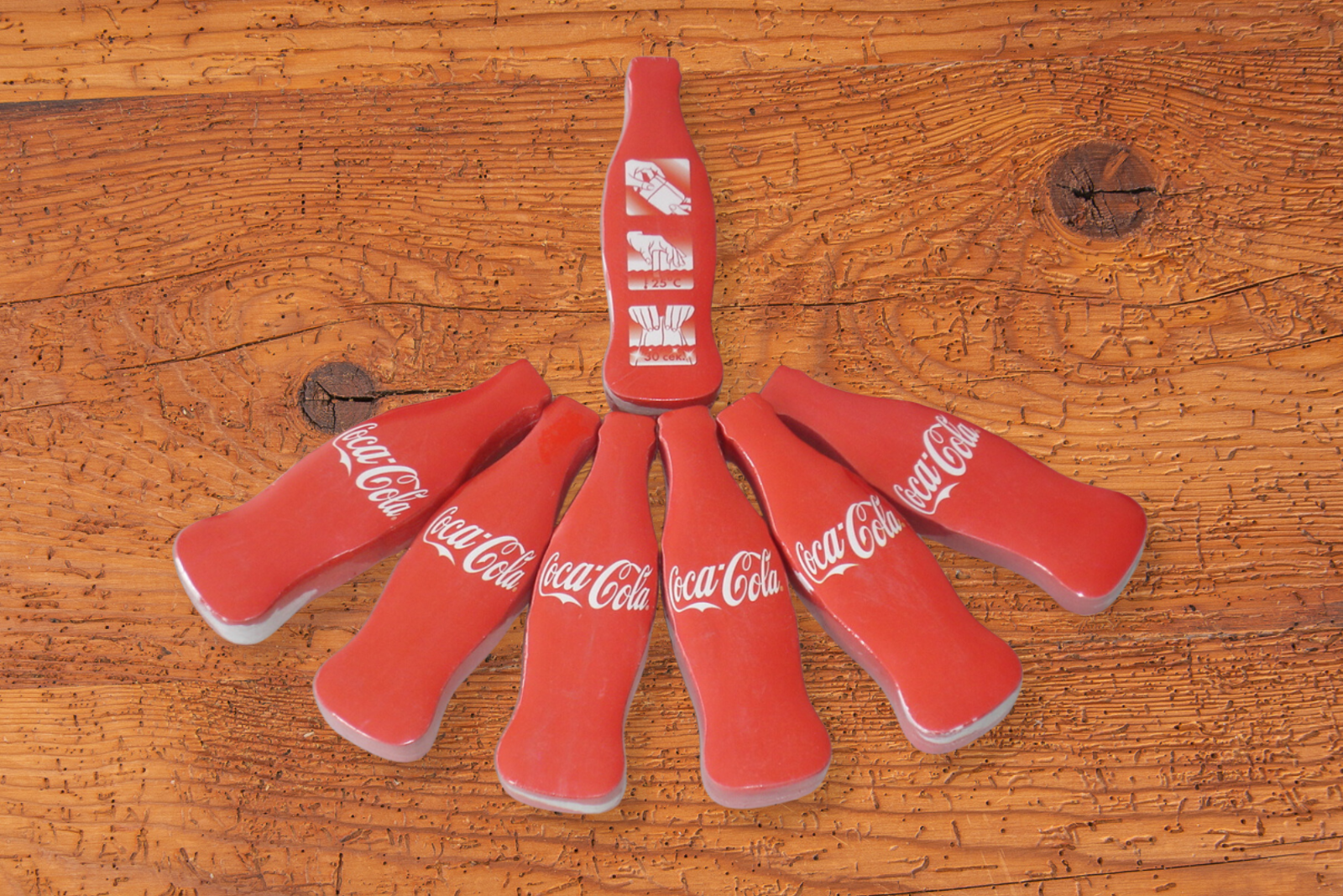 Gepresstes Handtuch in Sonderform CocaCola Flasche als Merch f&uuml;r Messen und Events.