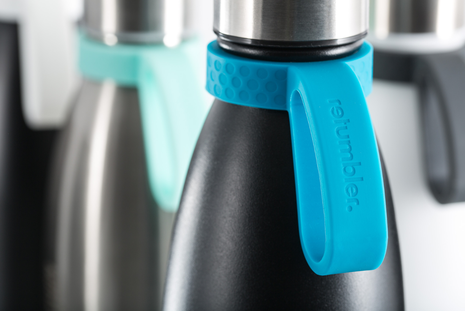 Retumbler Isolierflasche mit Schlaufe t&uuml;rkis als Werbeartikel.