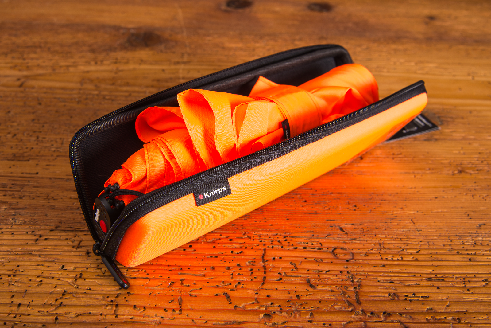 Neaonoranger Regenschirm von Knirps im offenen Dry-Case mit Logodruck als Werbemittel f&uuml;r Industrie und Handwerk