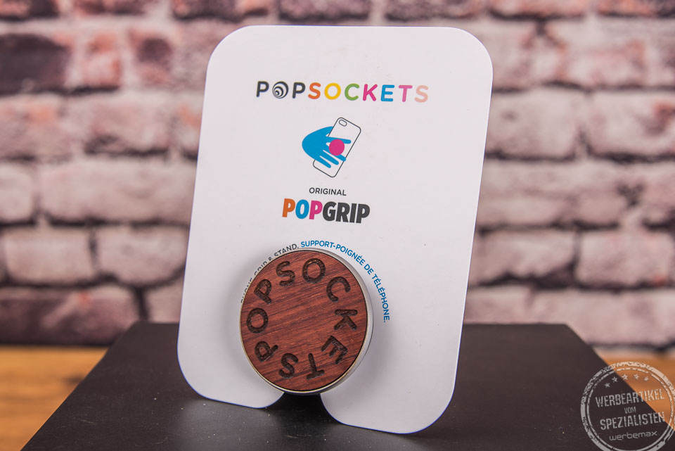 Popsocket PopGrip mit dunkler Holzeinlage &ndash; hochwertiges Werbemittel mit Logo.