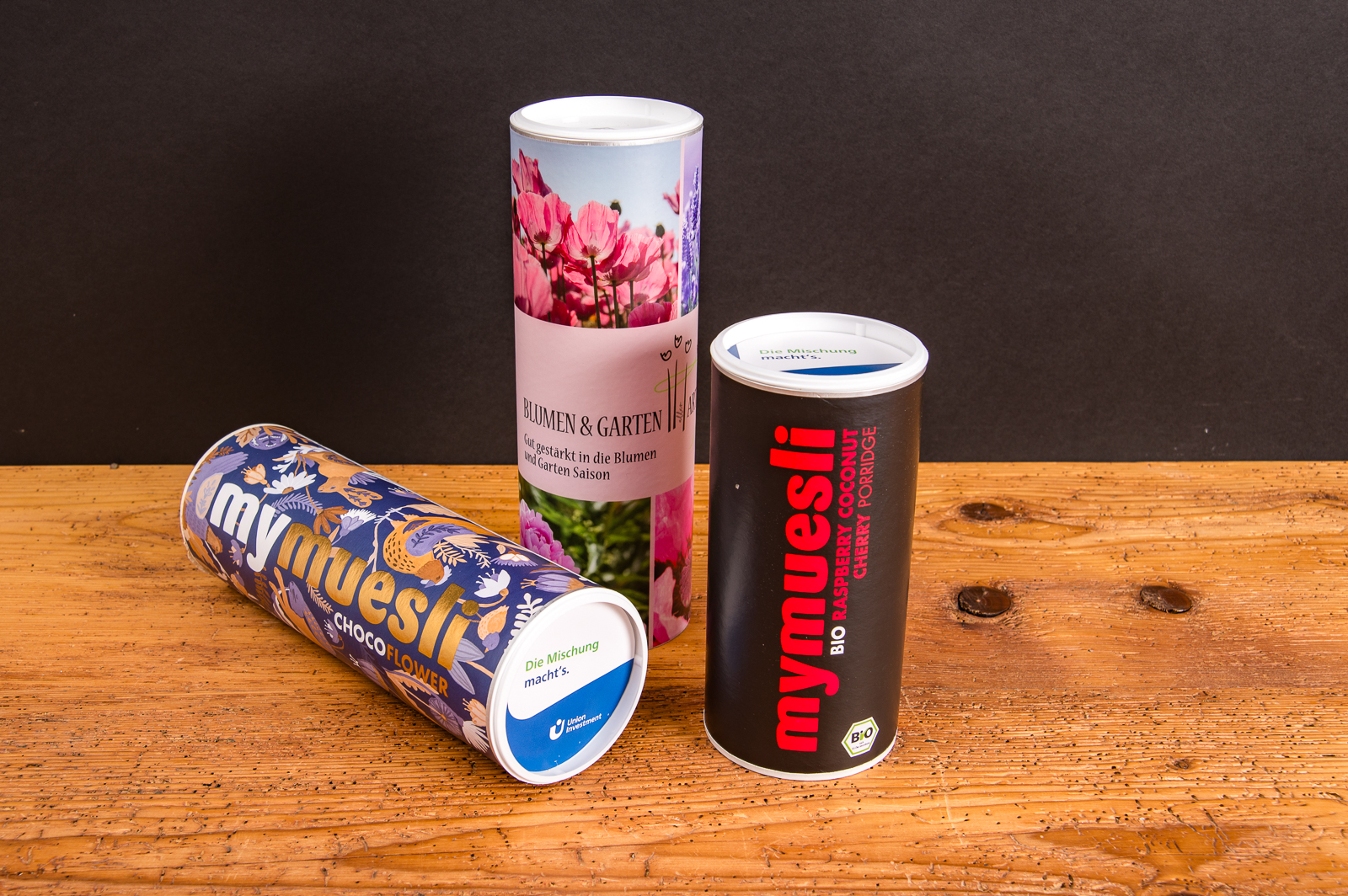 Drei mymuesli Dosen in unterschiedlichen Designs &ndash; Bio-M&uuml;sli und Bio-Porridge als modernes Werbegeschenk.