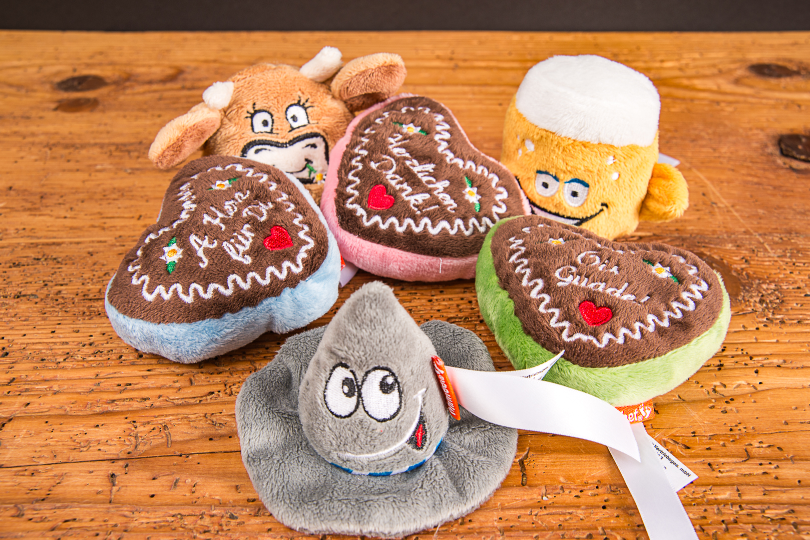 Displayreiniger Schmoozies als Werbeartikel &ndash; verschiedene Pl&uuml;schfiguren wie Lebkuchenherzen, Bier und Tiere.