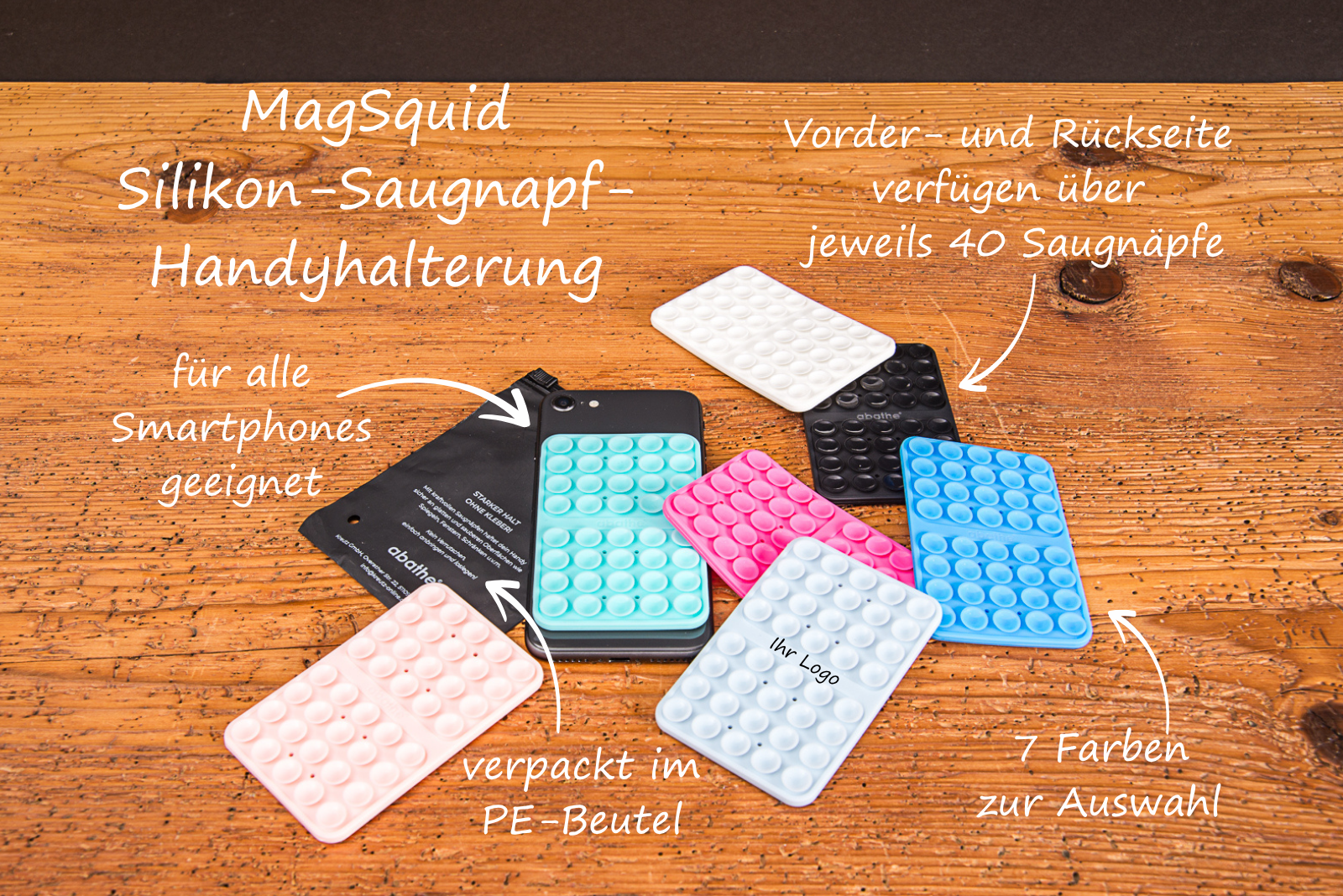 Infografik zur MagSquid Silikon-Saugnapf-Handyhalterung auf Holzgrund mit Hinweisen zu 7 Farben zur Auswahl, 40 Saugn&auml;pfen je Seite, Eignung f&uuml;r alle Smartphones und Verpackung im PE-Beutel.