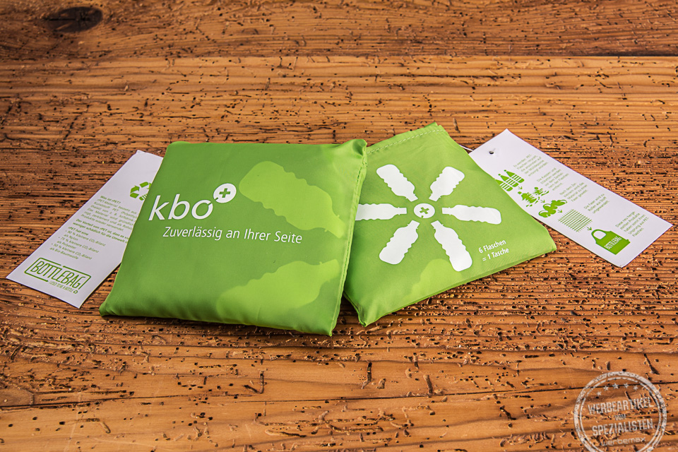 Werbetasche zusammengefaltet in gr&uuml;n mit Logodruck