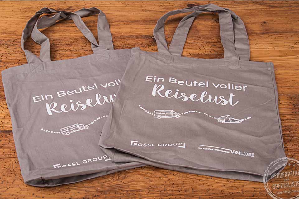 Messetasche Edda in grau mit wei&szlig;em Aufdruck Reiselust f&uuml;r die Firma P&ouml;ssl als Kundengeschenk.