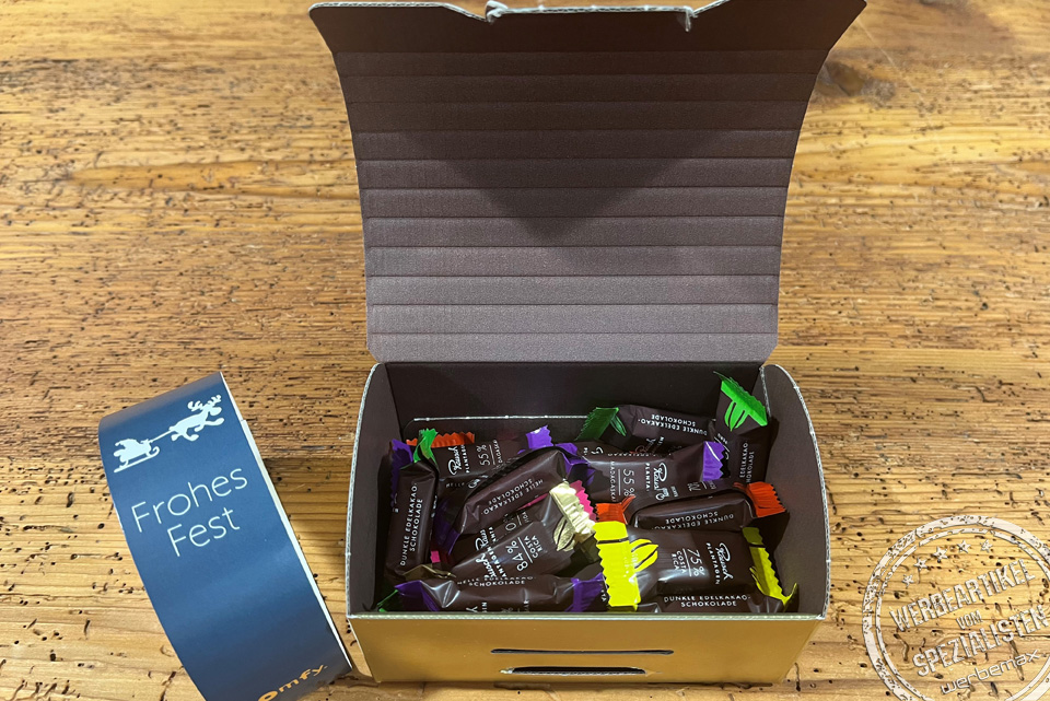 Rausch Goldbox helle und dunkle Schokolade in der Goldbox mit Werbebanderole