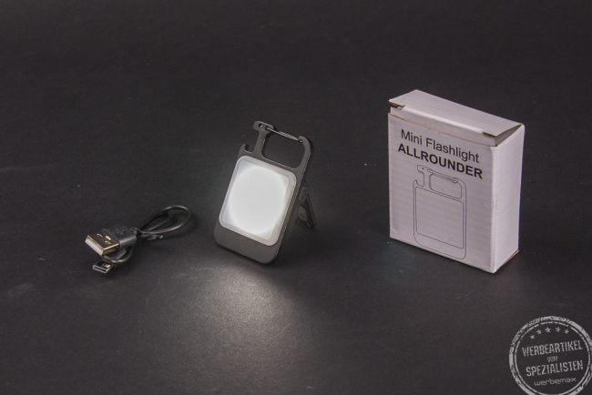 Mini-Taschenlampe mit Verpackung