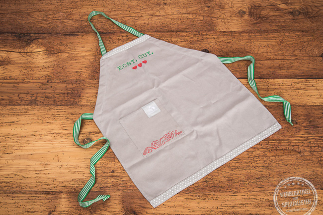 Kochschürze bestickt als Werbegeschenk von Bergbauern Milch