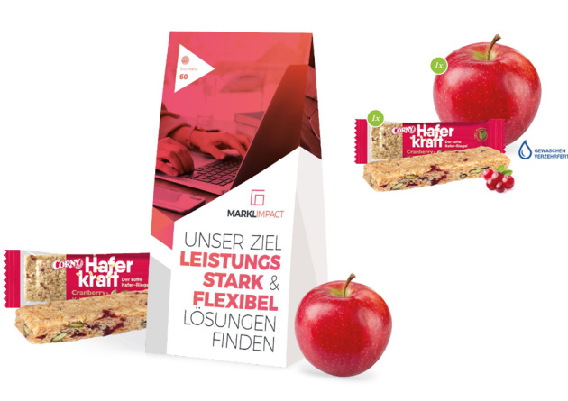 Power Bag individuell bedruckt und befüllt mit einem Apfel und einem Müsliriegel als Werbeartikel