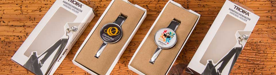 Neue Troika Oktoberfest Taschenhalter mit original Oktoberfest Motiv als Werbeartikel. 