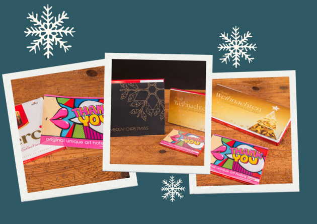 Drei Polaroids mit Bildern der Merci Finest Selection Geschenkpackung als Werbertikel.