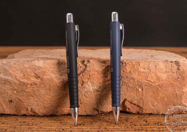 Poly Ball hochwertiger Faber-Castell Kugelschreiber mit Logo in schwarz und grau.