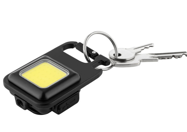 Mini Taschenlampe als Werbeartikel befestigt am Schlüsselanhänger. 