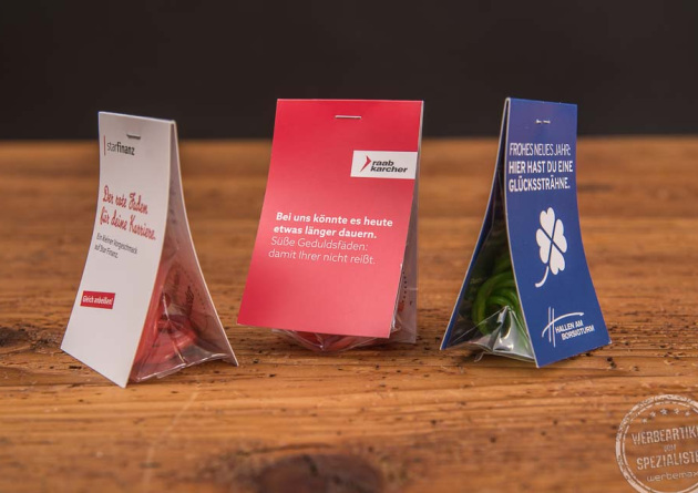 3 Naschtaschen gefüllt mit Fruchtgummi Schnüre als Werbeartikel mit Logo.