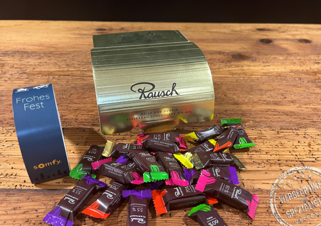 Rausch Schokolade in der Goldbox mit Werbebanderole
