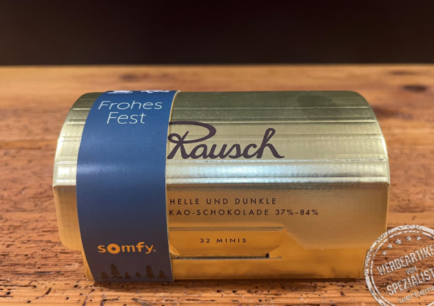 Rausch Goldbox mit Werbebanderole als Werbeartikel