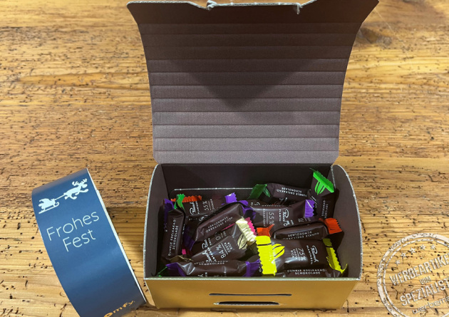 Rausch Goldbox helle und dunkle Schokolade in der Goldbox mit Werbebanderole