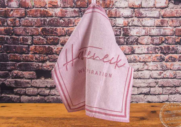 Umsetzungsbeispiel Logo auf Geschirrtuch