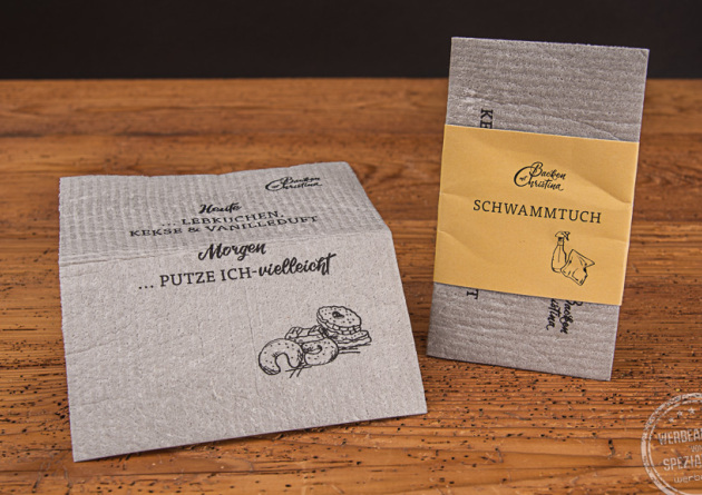 Zwei Schwammt&uuml;cher in grau als Werbeartikel mit Logo Backen mit Christina bedruckt