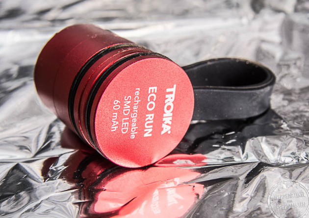 Troika Taschenlampe mit Logogravur als Werbegeschenk f&uuml;r Sicherheit sorgend.