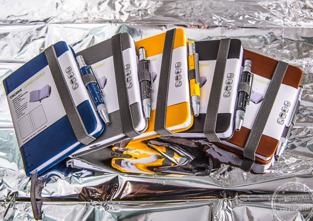 TROIKA LILIPAD+LILIPUT CONSTRUCTION Mini-Notizbuch DIN A7 Farb&uuml;bersicht mit Multitaskingstift und Logodruck von werbemax