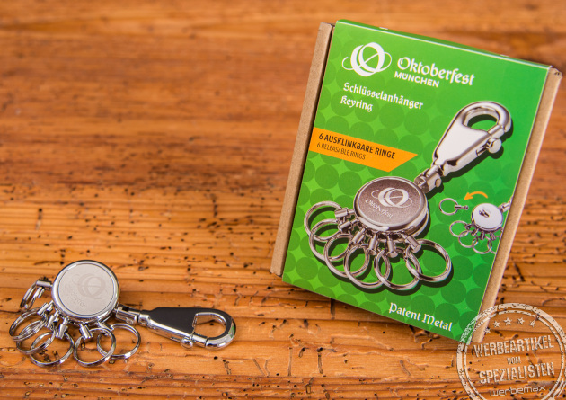 Praktischer Schl&uuml;sselanh&auml;nger von Troika mit 6 ausklinkbaren Schl&uuml;sselringen. Das offizielle Oktoberfestlogo ist in der Mitte graviert. 