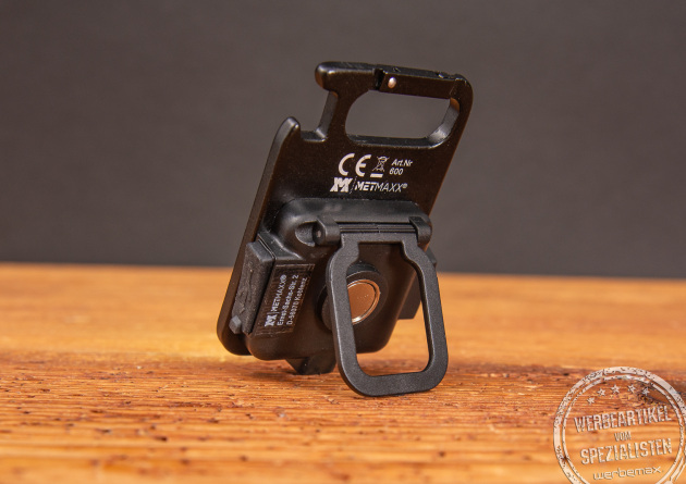 Ein aufgestelltes Worklight auf einer Holztischplatte.