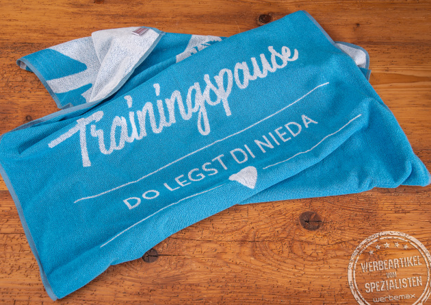 Badetuch mit Logoeinwebung als Werbeartikel.