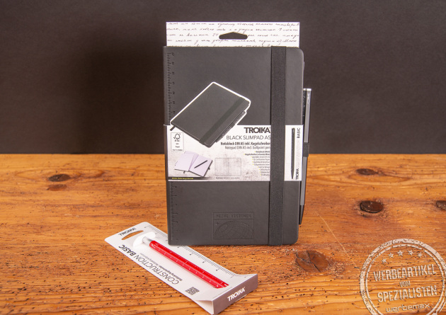 Schwarzes Notizbuch aus Kunstleder mit farbigen Kugelschreiber von Troika