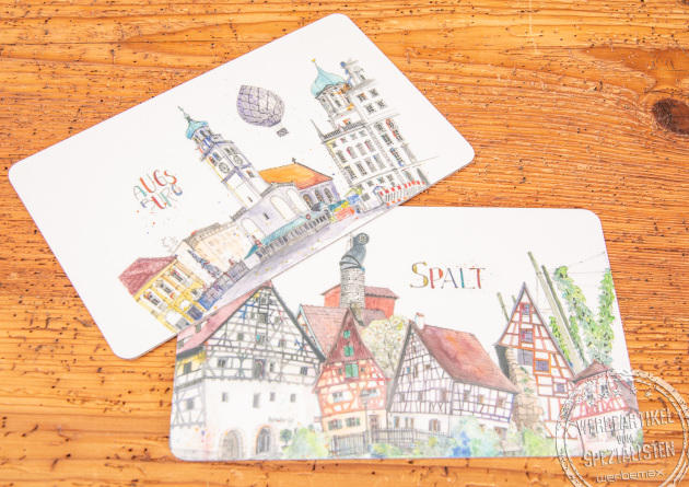 Zwei Ricolor Brettchen mit Bedruckung als Werbeartikel.