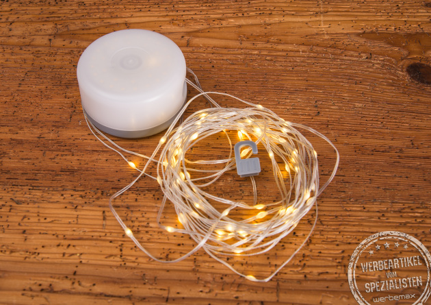 8m lange Lichterkette als Outdoorlampe. Innovatives Werbegeschenk mit Ihrem Logo als Domingaufkleber.