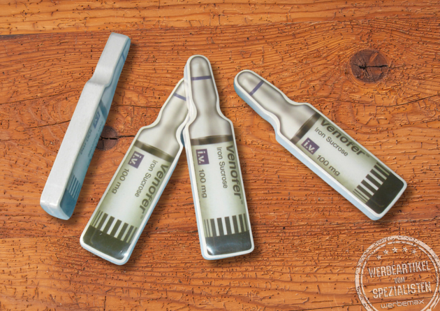 Gepresstes Handtuch in Sonderform Ampulle als Werbeartikel.