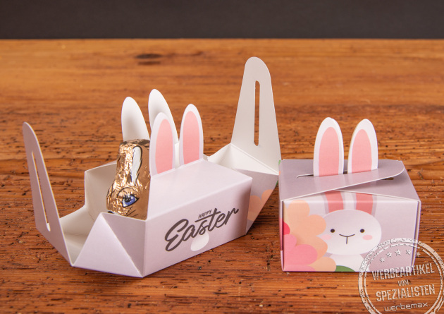 Geschenkbox Mini mit Verschlussform Hasenohren und Füllung Schoko-Osterhase.