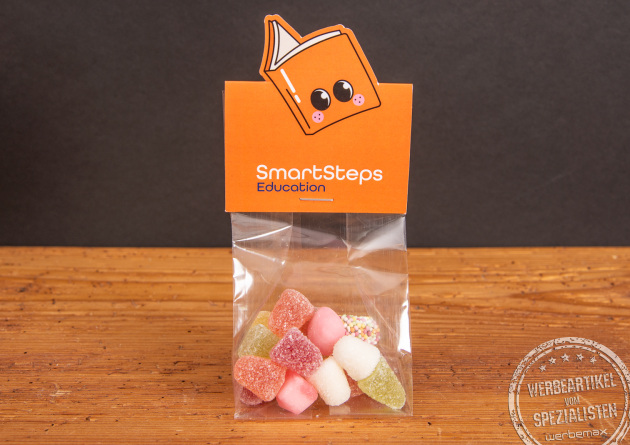 Saure Fruchtgummi im individuellen Blockbeutel mit Logostanzung ganz nach Ihren Vorgaben. Hier am Beispiel eines Buches. 