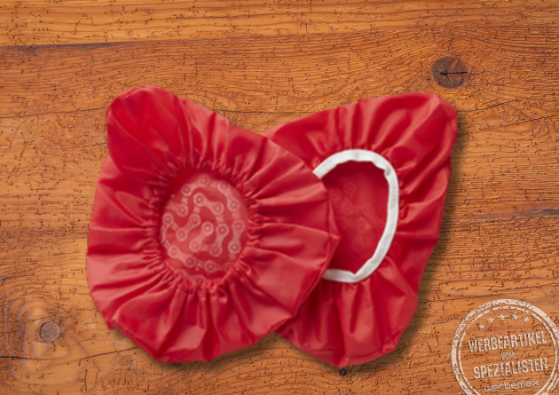 Zwei rote Sattelbez&uuml;ge mit Logodruck als Werbeartikel.