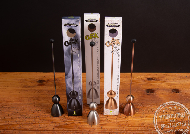 Clack Eieröffner von take2 in Schwarz, Edelstahl und Roségold mit Originalverpackung – stylisches Frühstückszubehör Made in Germany.