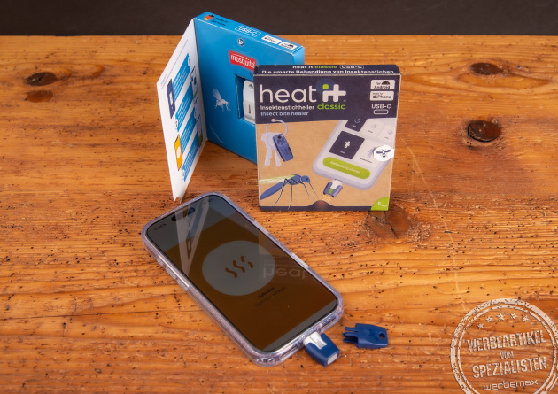 heat it classic Insektenstichheiler mit Smartphone und Verpackung – chemiefreies Sommer-Werbegeschenk für Reisen und Outdoor.
