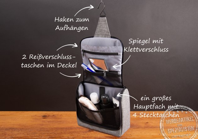 Ge&ouml;ffneter reisenthel Kulturbeutel mit Haken zum Aufh&auml;ngen, zwei Rei&szlig;verschlusstaschen, Spiegel mit Klettverschluss und gro&szlig;em Hauptfach mit vier Stecktaschen &ndash; praktischer Reise-Organizer und Werbegeschenk von reisenthel.