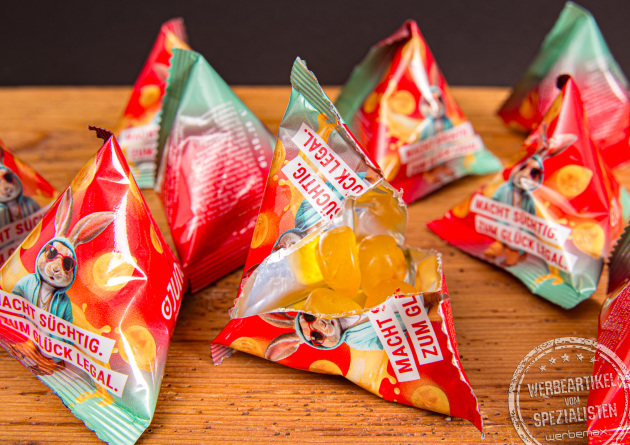 Fruchtgummi-Tetraeder aus Papierfolie mit individueller Logo-Gestaltung als modernes Werbemittel.