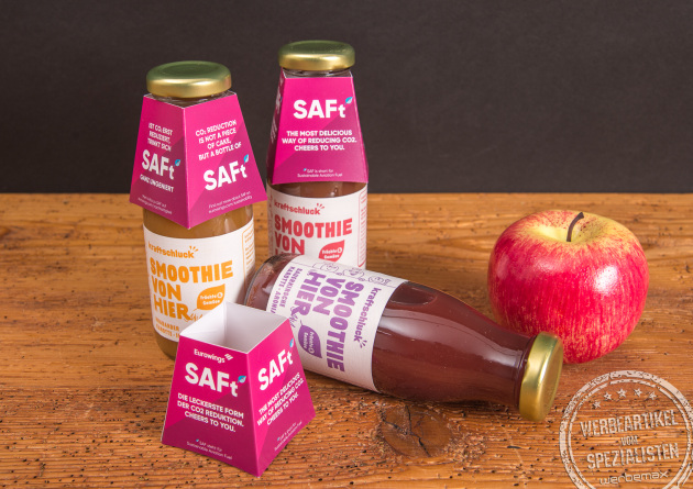 Kraftschluck Bio Smoothie mit pinker Verpackung und Apfel &ndash; gesunde Werbegeschenke mit Logo aus regionaler Herstellung