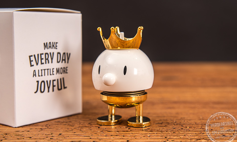 Hoptimist Wackelfigur f&uuml;r den Schreibtisch als Werbegeschenk im Karton.